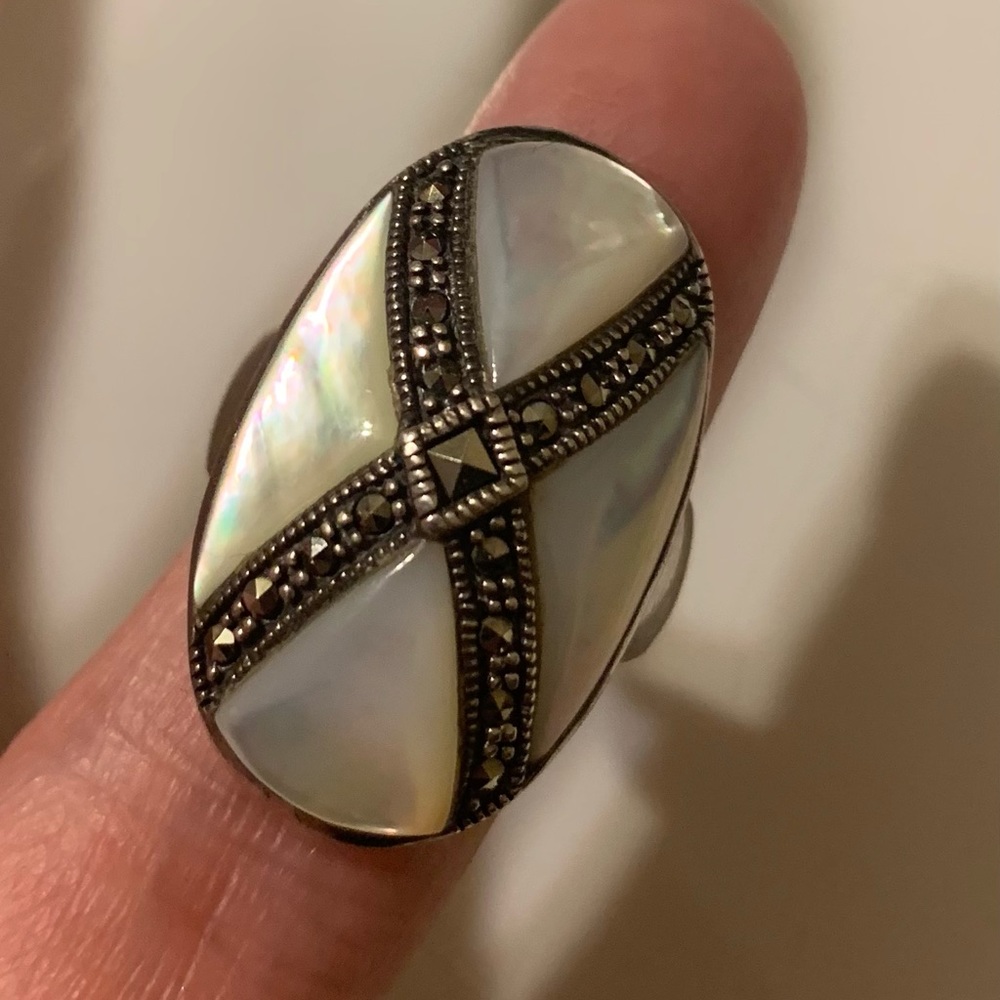 Gorgeous Sterling Silver Mother of Pearl Ring with Marcasite Stones.